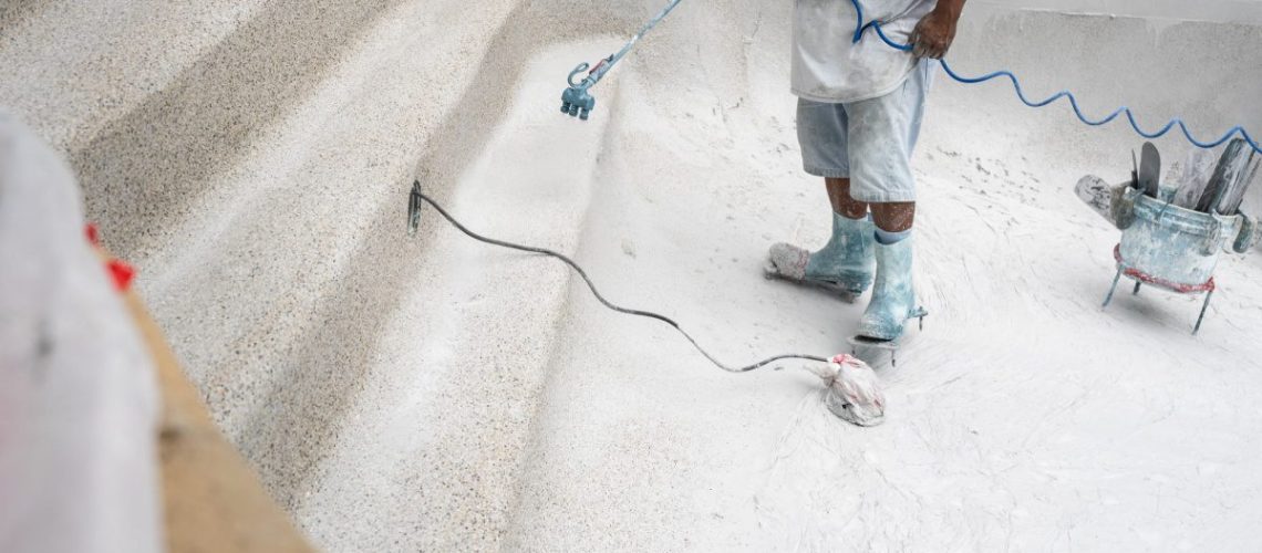 worker replastering pool, BPS, Backyard Pool Specialists, Spring Texas